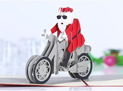 כרטיס פופ -אפ חגיגי של חגיגי חג המולד, עם אופנוע שלג מעניין תלת -ממדי, עץ חג המולד ועיצוב איילים, הביא סנטימנטים חמים, נוגעים לזיכרונות למשפחה, חברים, אוהבי חג המולד